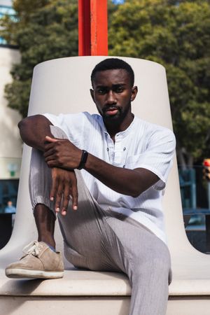 Stylish Black man in city street