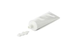 Blank tube with toothpaste isolated on light background