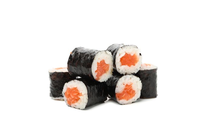 Japanese food. Delicious sushi rolls isolated on light background