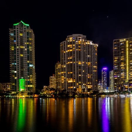 Miami skyline across the sea during night time