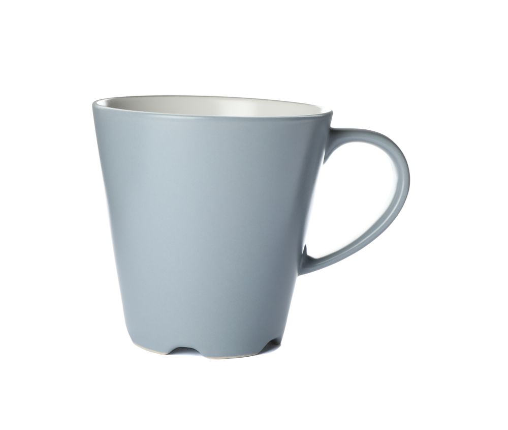 Empty ceramic cup isolated on blank background