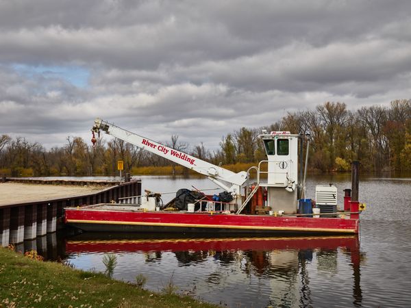 Barge with a crane in Withers Harbor in Red Wing, Minnesota