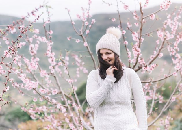 Happy woman in spring countryside