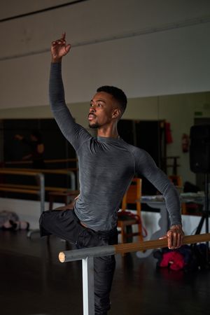 male dancer in a warm-up and dancing in a ballet class