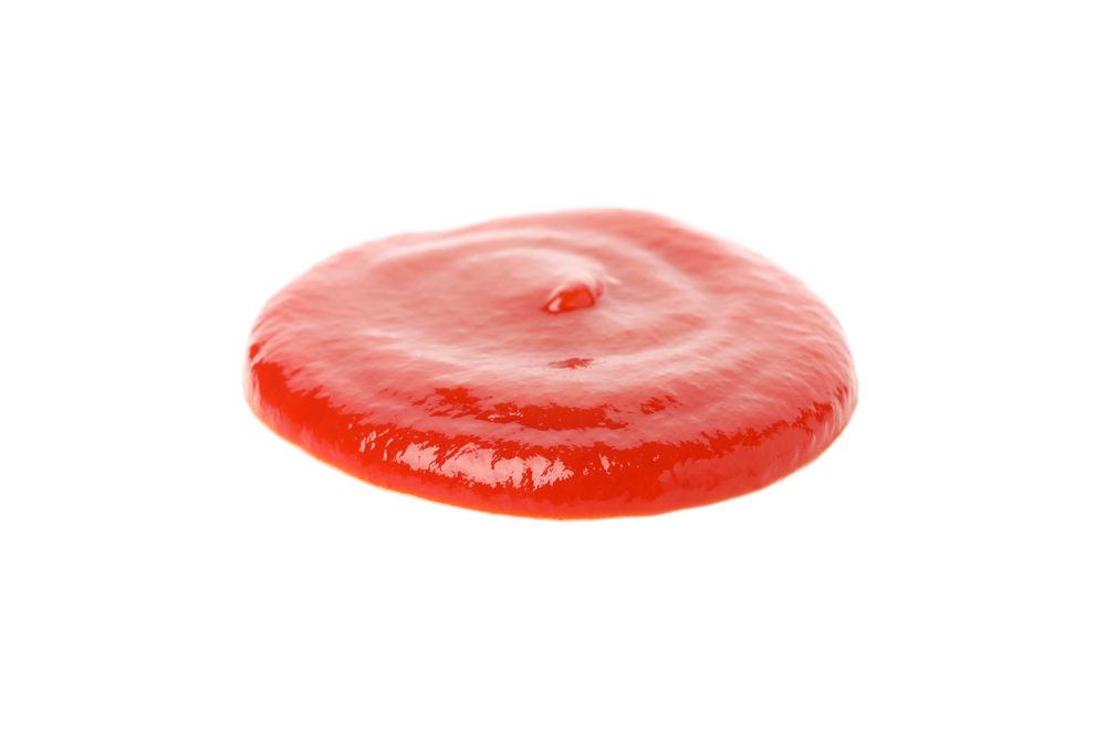 Tasty tomato sauce isolated on neutral background