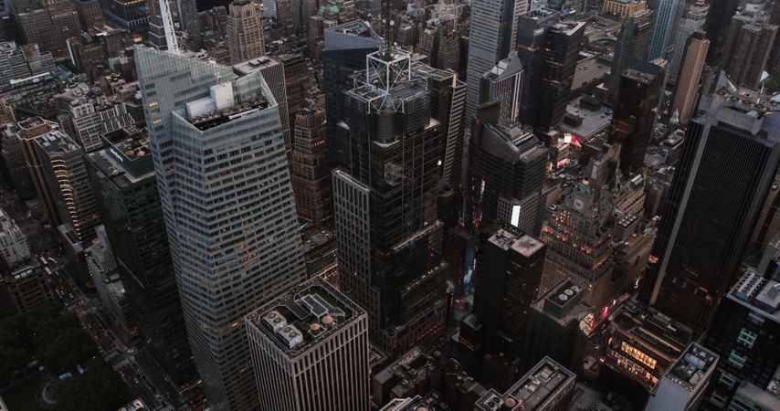 Top Down Aerial View of Times Square in New York City in Midtown Manhattan. Helicopter Flying Above the Commercial Neighbourhood, Tourist Destination and Entertainment Hub in NYC