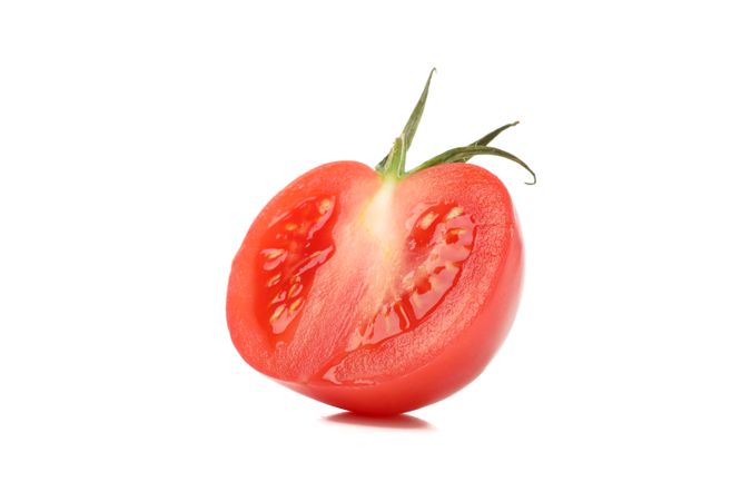 Fresh ripe tomato isolated on neutral background