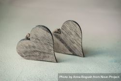 Valentine's day concept with two wooden heart ornaments  0PjjEN