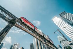 Looking up at a train on a monorail