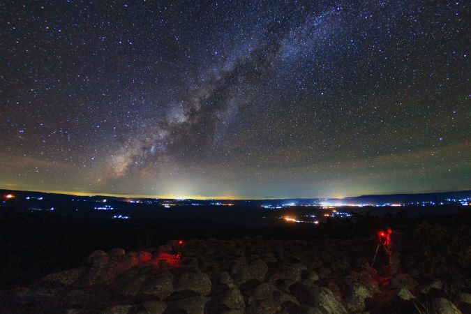 Milky way galaxy with knob stone ground is name Lan Hin Pum viewpoint at Phu Hin Rong Kla National Park in Phitsanulok, Thailand