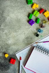 Bright colorful toy blocks with note book