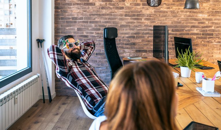 Happy office worker because he goes on vacation