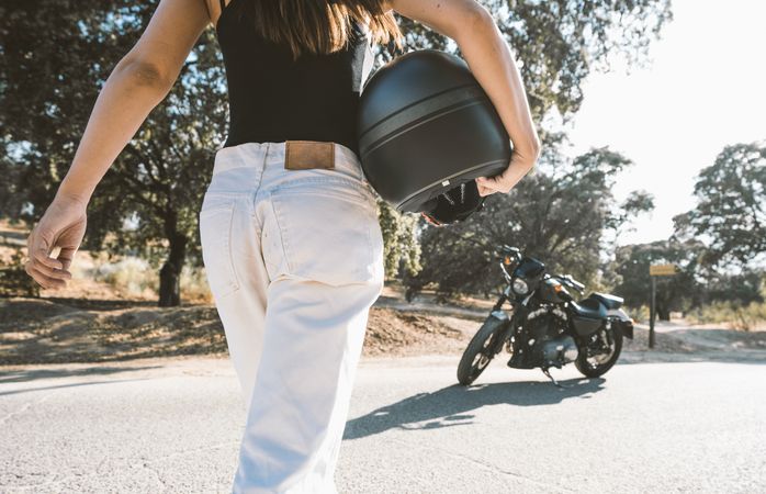 Back view woman with helmet