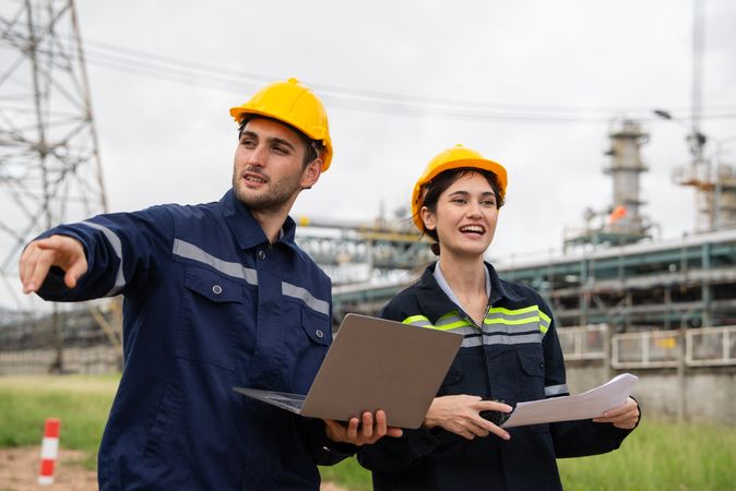 Engineer worker checking project at petrochemical factory or refinery oil plant industrial.