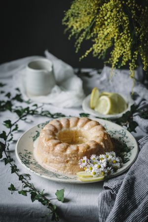Bundt cake cut into pieces on table