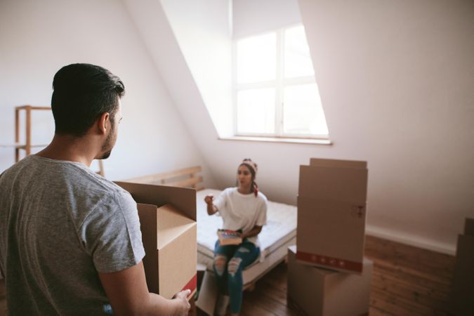 Young couple moving into new apartment