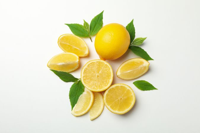 Fresh lemons on light background, top view. Ripe fruit
