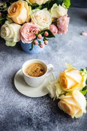 Yellow & pink roses with a cup of coffee