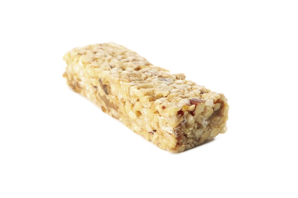 Tasty granola bar isolated on plain background