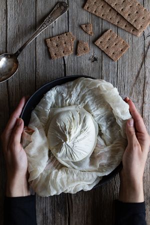 Crunchy crackers near fresh labneh