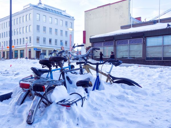 Bicycles buried in snow
