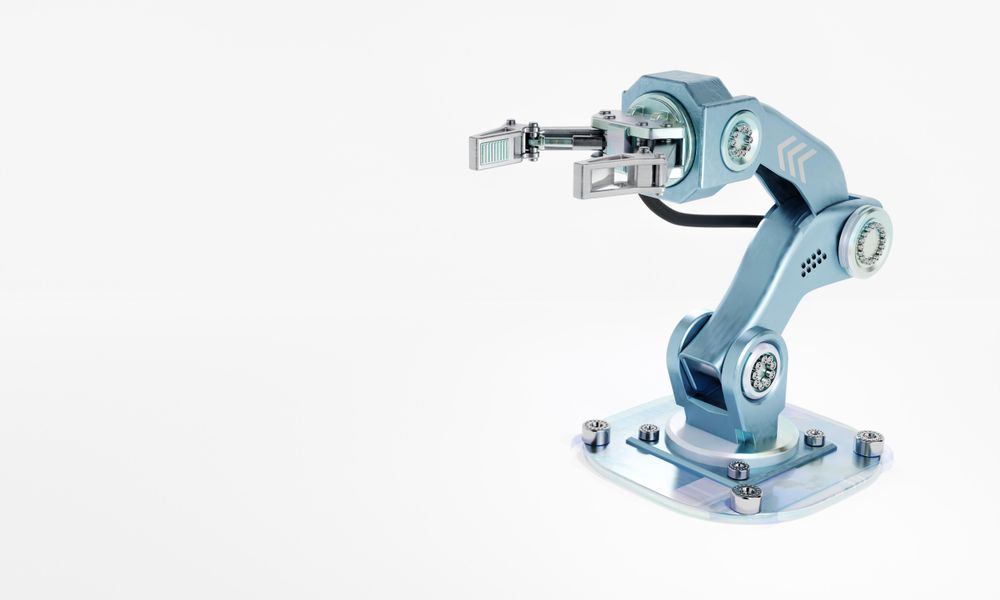 Blue silver metallic robotic arm, copy space