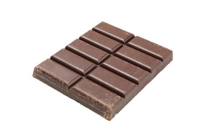Tasty chocolate bar isolated on blank background