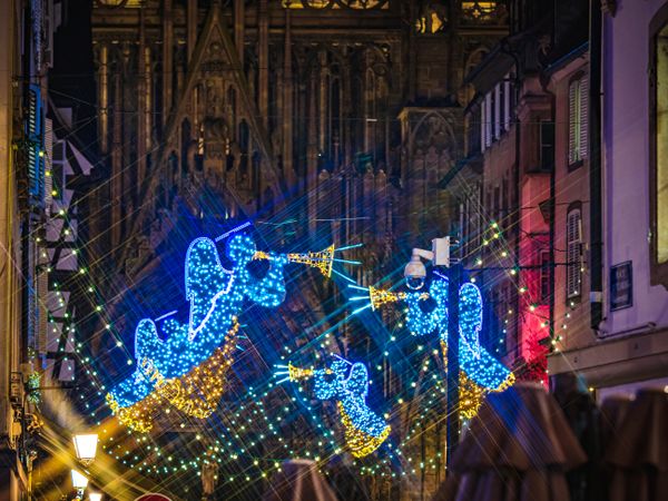 Angel light decorations above Strasbourg Christmas market