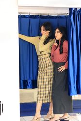 Two  Asian Girl doing Photoshoot at the Blue Photobooth Stand