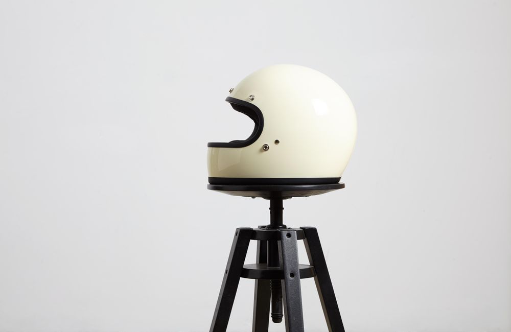 Side shot of motorcycle helmet on a stool
