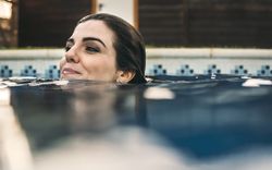 Happy woman in pool