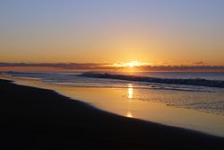 Colorful sunset over peaceful seashore