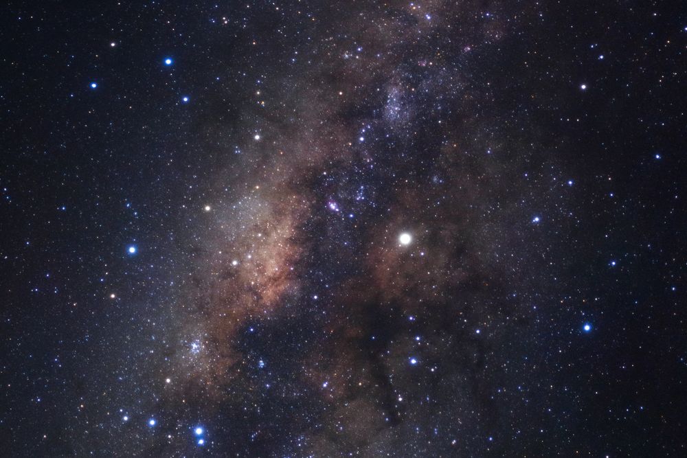 Milky way galaxy with stars and space dust in the universe, Long exposure photograph, with grain.