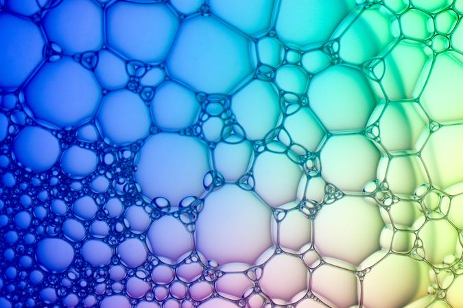 Abstract background bio technology, macro photography foam and water with gradient background. Molecule multicolor backgorund