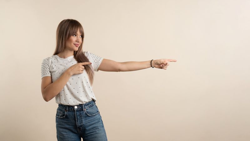 Woman point index finger