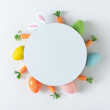 Easter circle of carrots and pastel eggs
