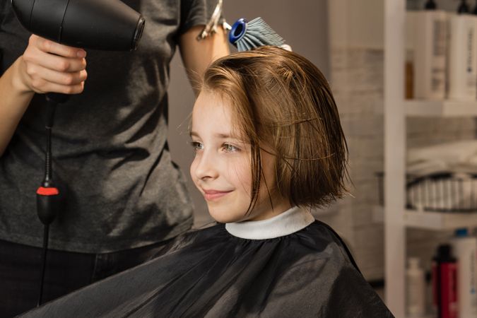 Child Model Getting Haircut