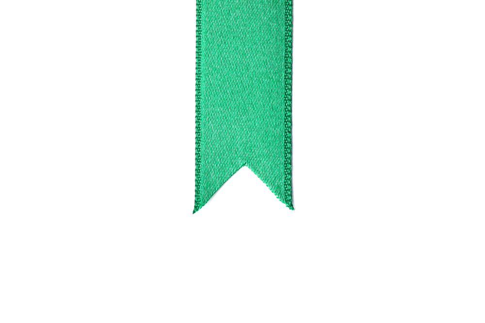Green ribbon isolated on blank background. Gift concept