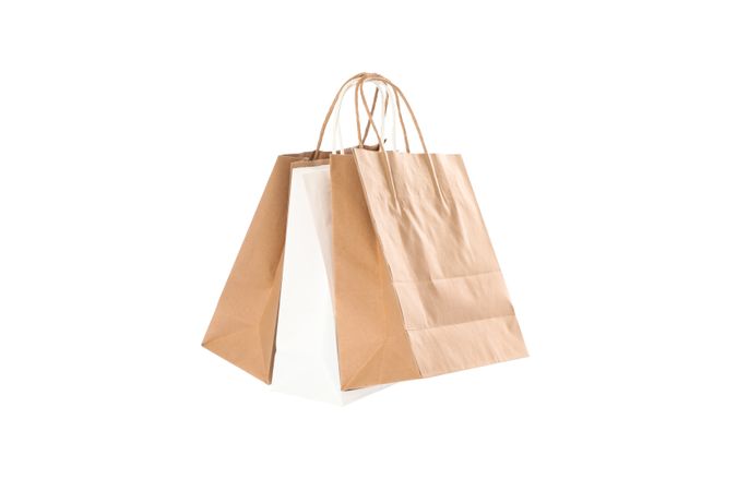 Empty paper bags isolated on blank background