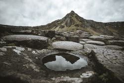 Deserted cliffs and cloudy sky