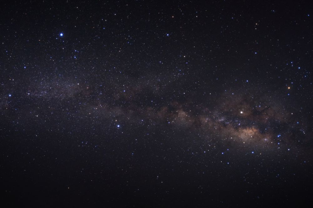 milky way galaxy and space dust in the universe, Long exposure photograph, with grain.