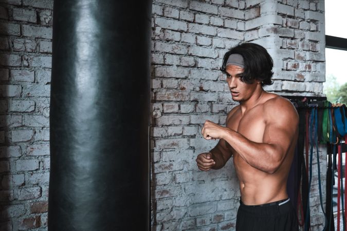 man boxing in gym