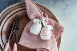 Easter table setting with rabbit figurines