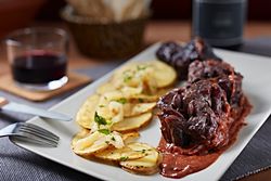 Stewed meat with sauce and potatoes