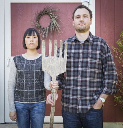 Fun Interracial Couple Portrait Simulating the American Gothic Painting