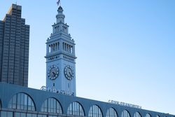 Clock tower of railway station in city