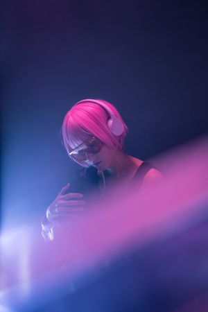 Woman sitting and listening to music