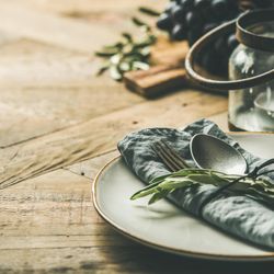 Close up of fall holiday table decoration setting, copy space, square crop