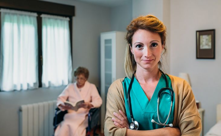 Female doctor posing in a clinic