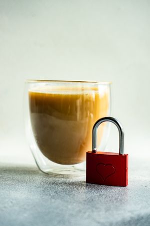 Coffee drink with red padlock